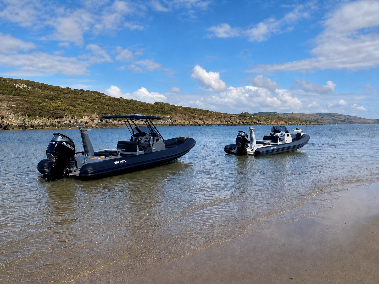 Two BRIG RIBs anchored in shallow water near Abersoch on the Llŷn Peninsula