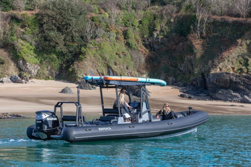 BRIG RIB underway near rocky coastline in North Wales